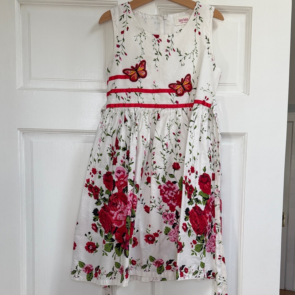 Charming White Dress with Red Floral and Butterfly Accents